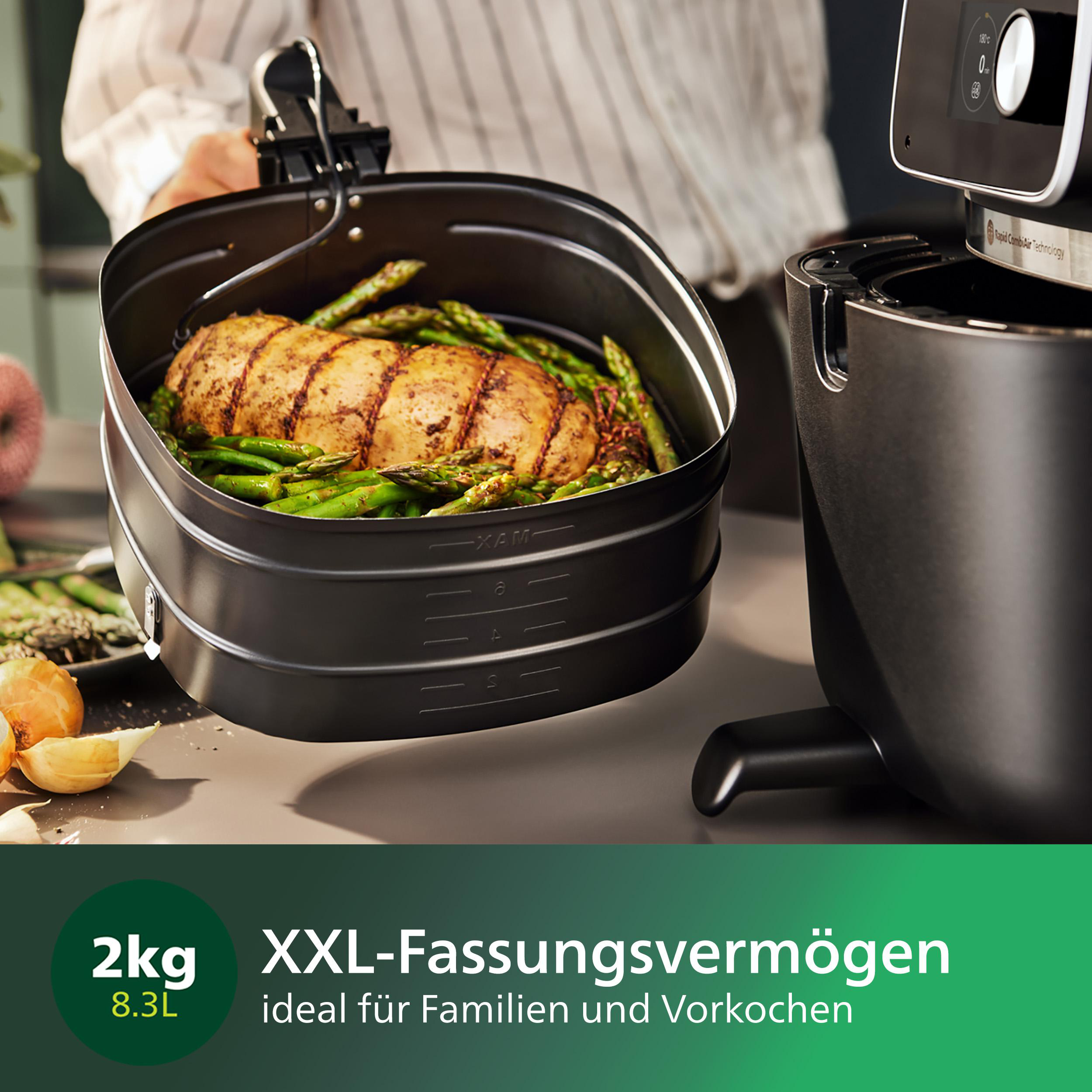 Eine Heißluftfritteuse mit gekochtem Essen und Text: 2kg, XXL-Fassungsvermögen.