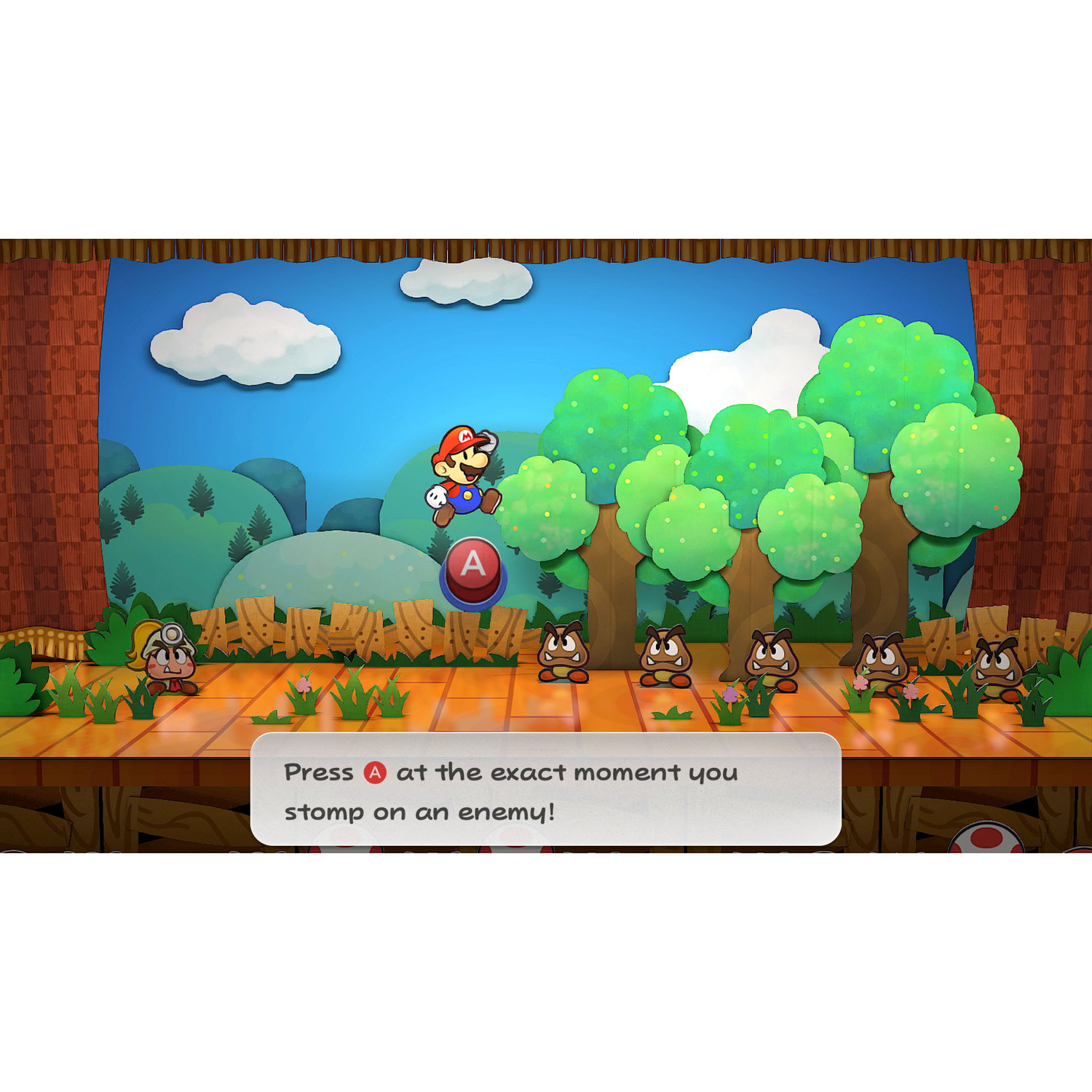 A video game scene with Mario jumping over a goomba, with a speech bubble instructing player.