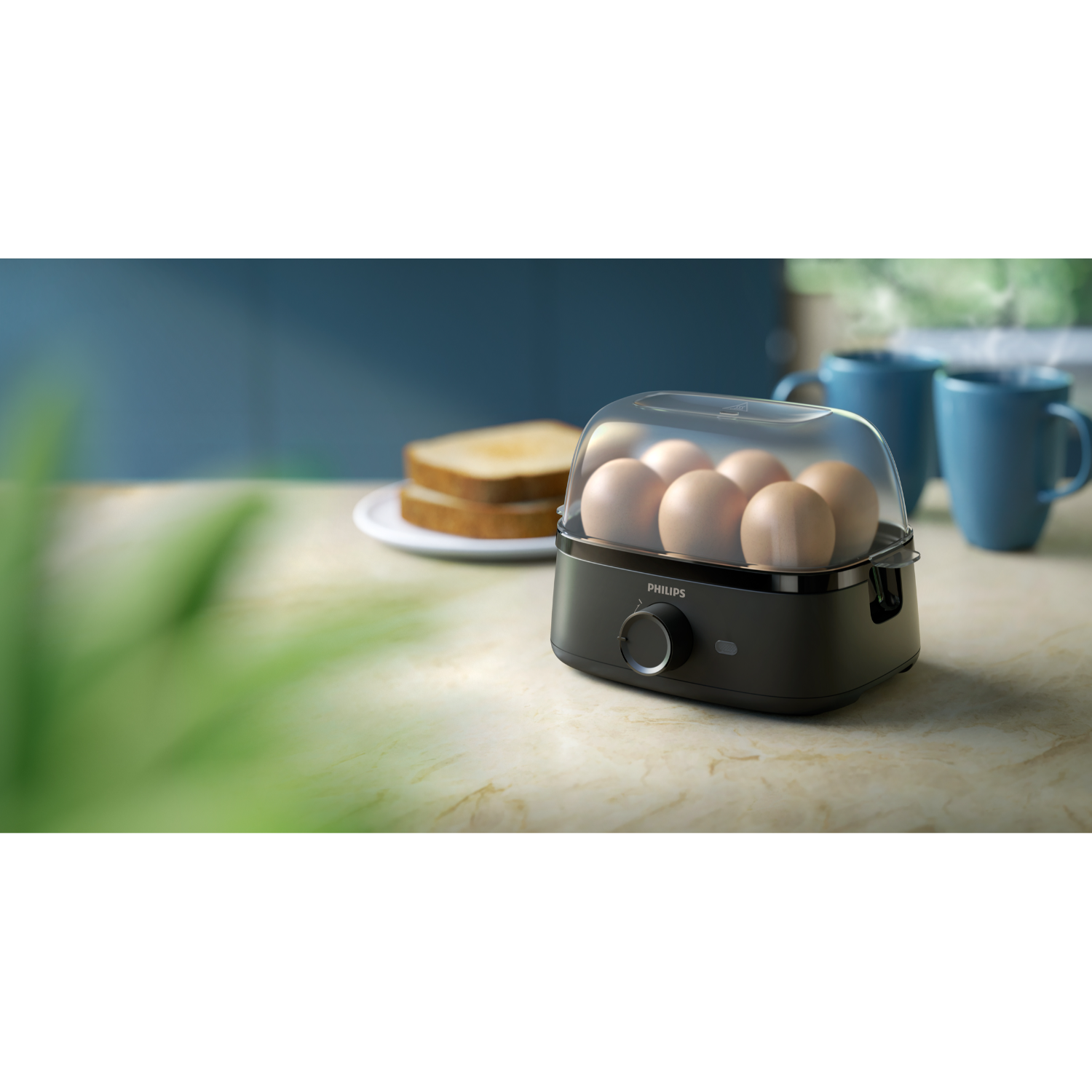 Black egg boiler with eggs inside, with a white background.