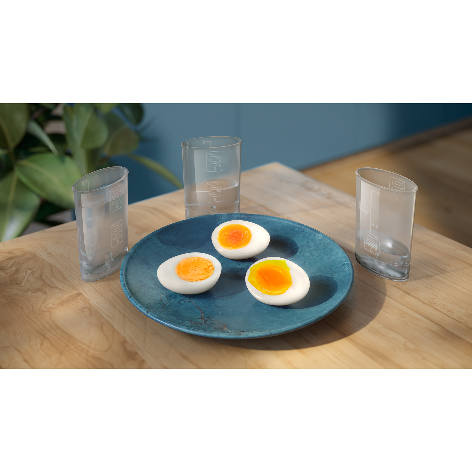 Three halved boiled eggs on a blue plate, next to two glasses of water on a wooden table.