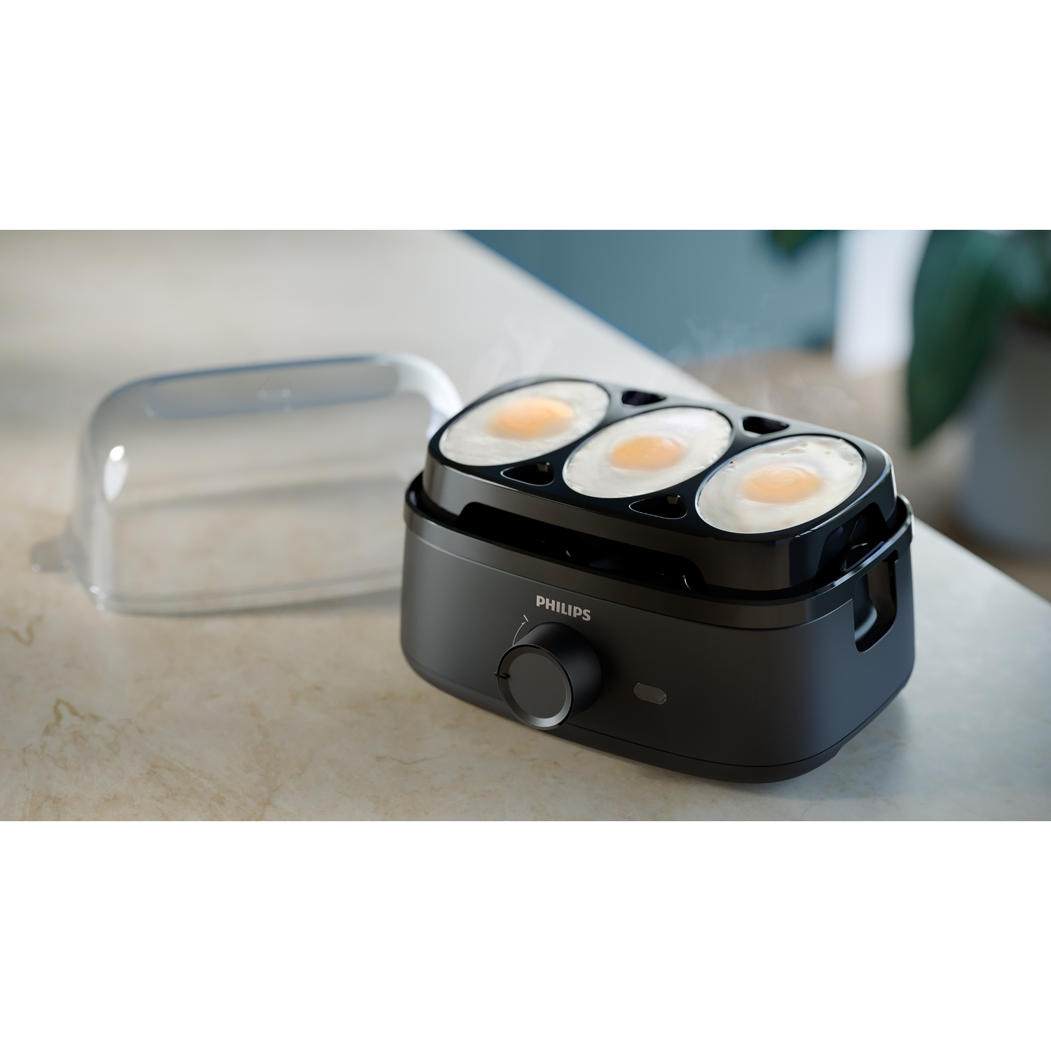 An egg cooker with three eggs and a lid on a kitchen counter.
