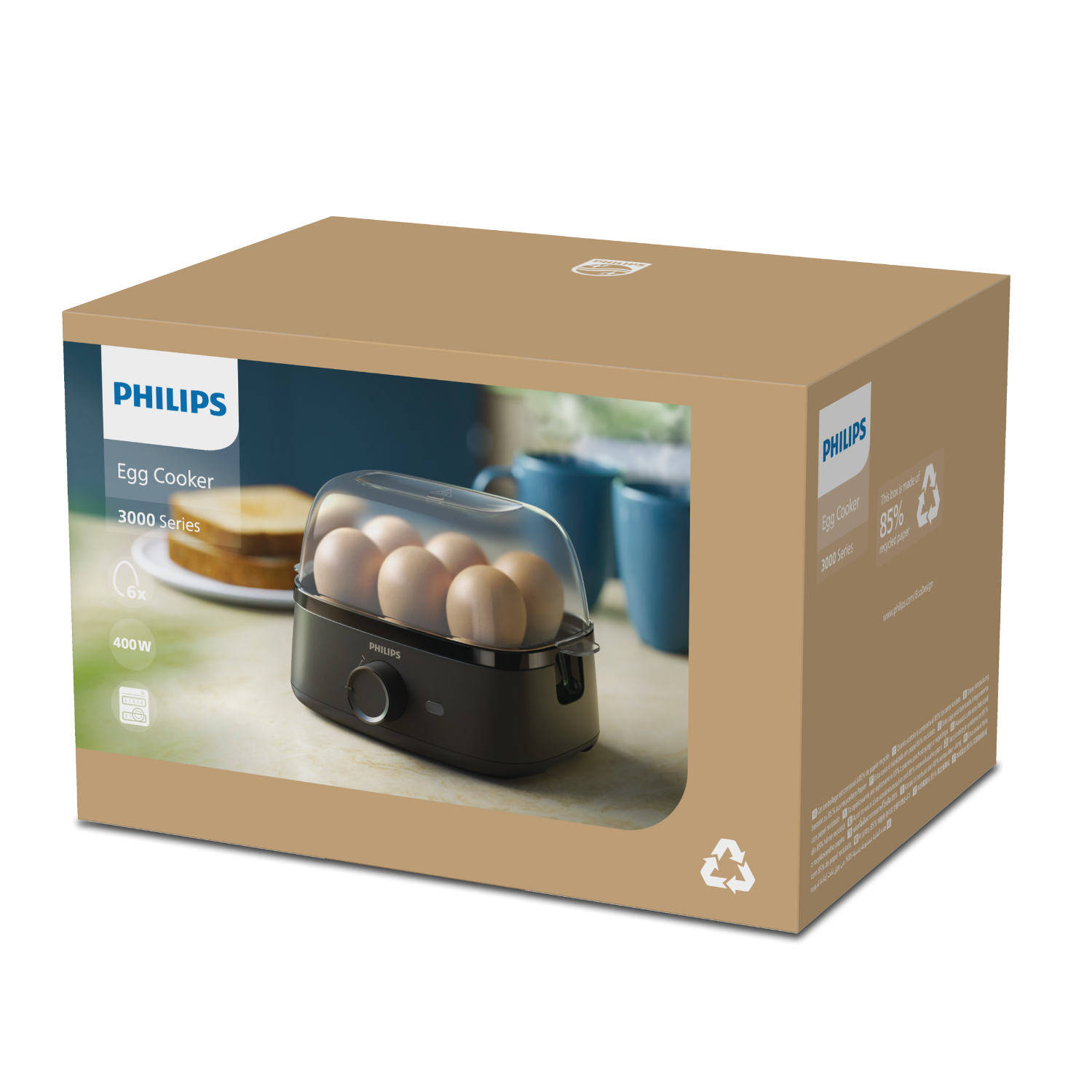 A Philips egg cooker box with eggs and a sandwich on it.