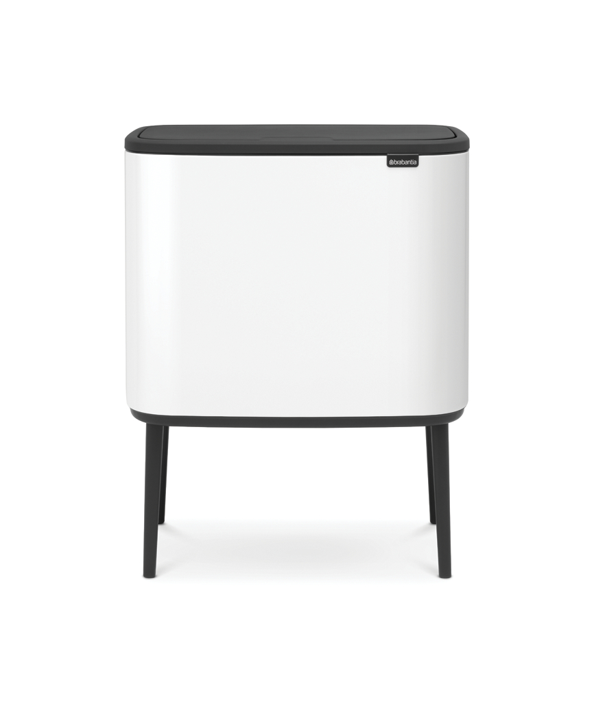Ein weißer Mülleimer mit schwarzem Deckel und Beinen, beschriftet mit 'brabantia'.