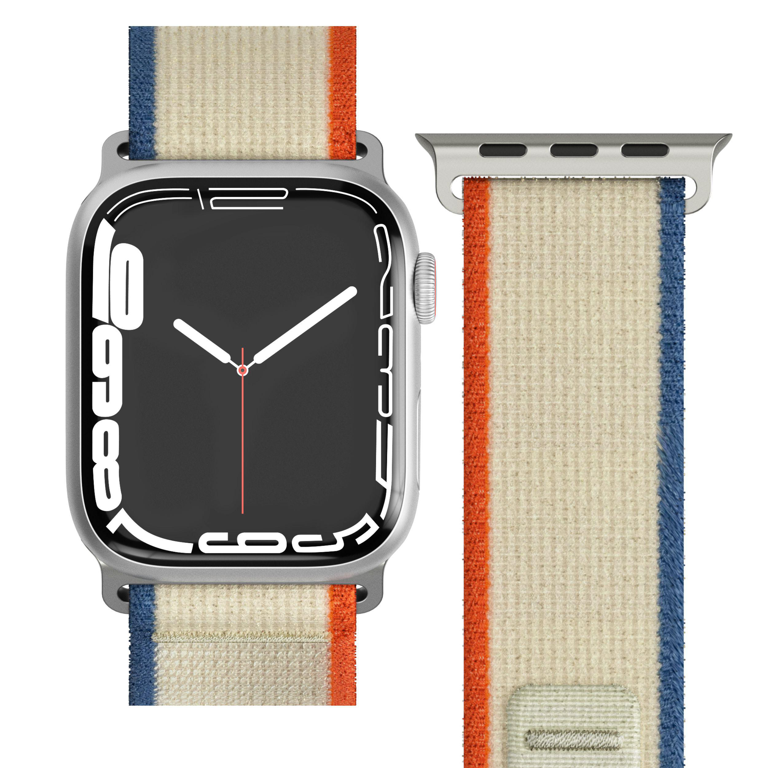 Silberne Apple Watch mit cremefarbenem, orangefarbenem und blauem Stoffarmband. Zeigt die Zeit.