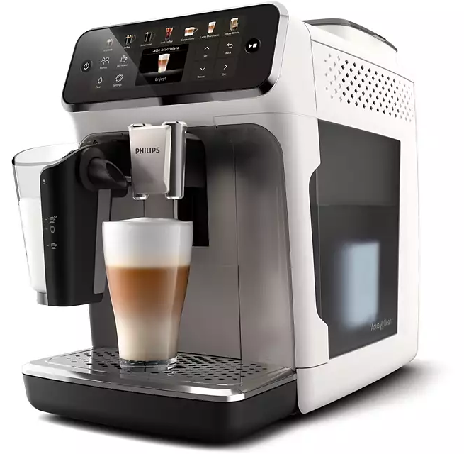 Fehér-fekete kávéfőző latte macchiato-val és egy tejtartóval.