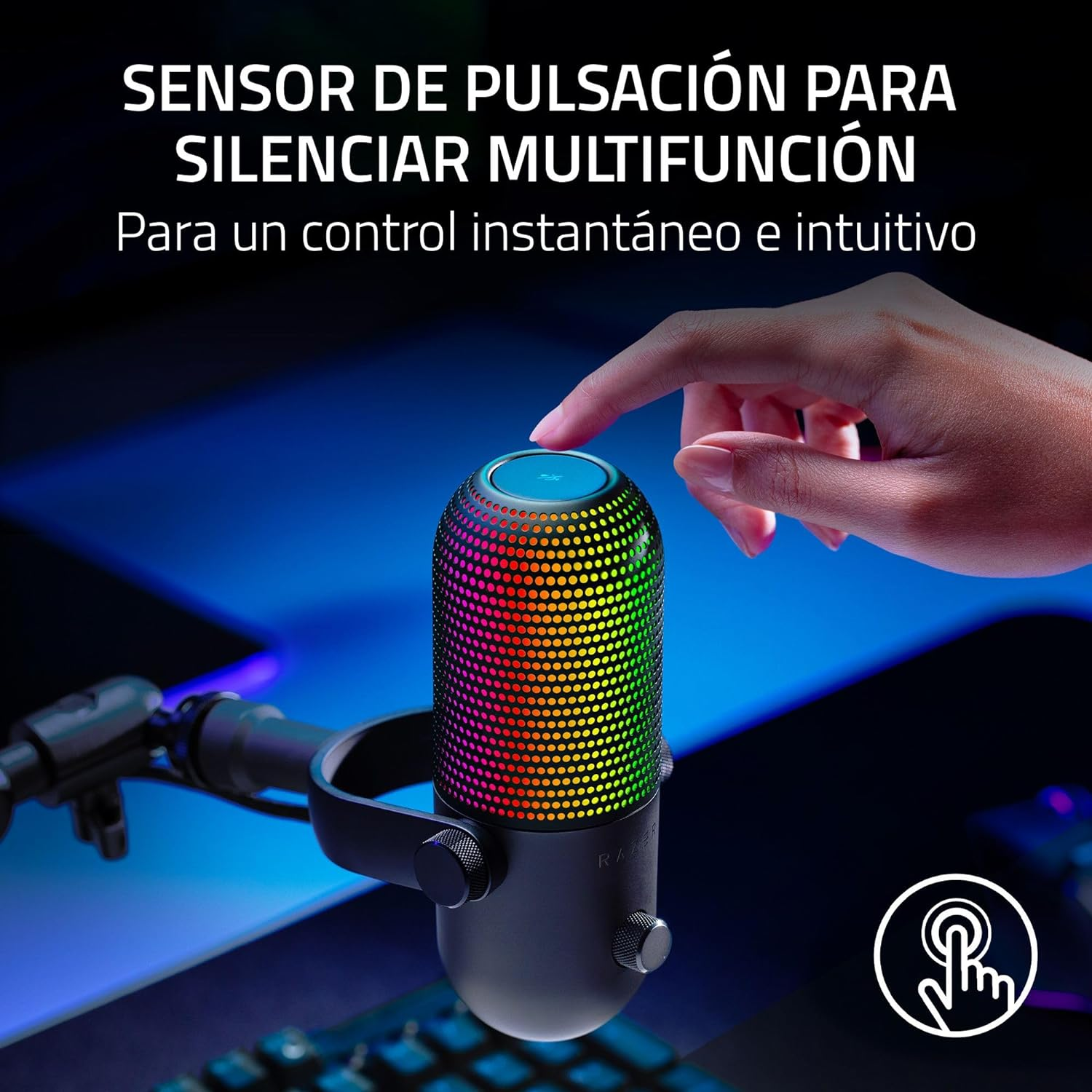 Micrófono negro con luces coloridas. Un dedo toca la parte superior. Texto: 'Control instantáneo'.