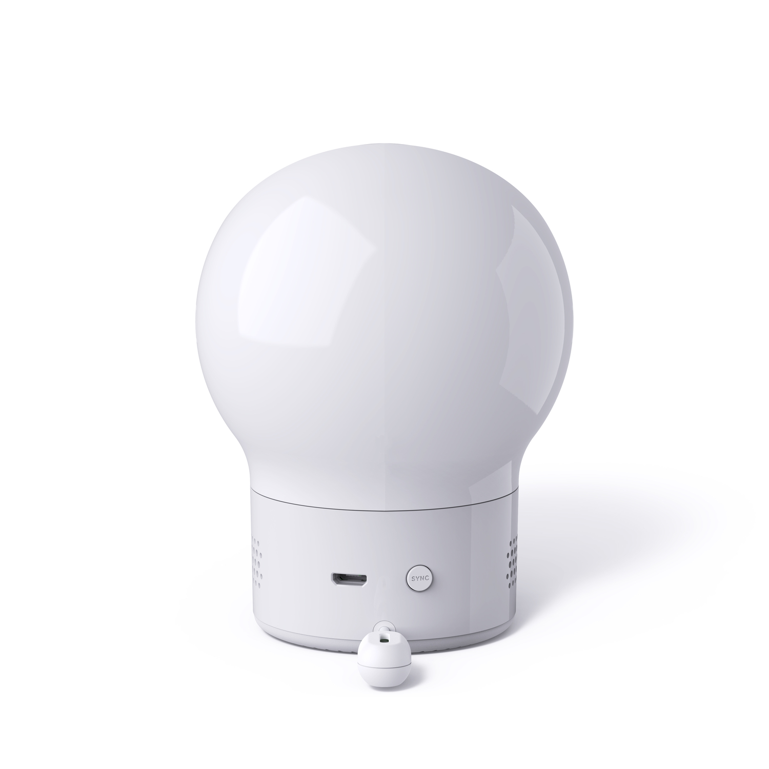 Une lampe blanche en forme d'ampoule avec une petite télécommande attachée sur fond blanc.