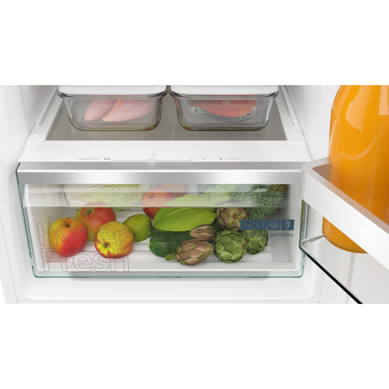 Refrigerator interior with fresh produce. Apples, artichokes, and vegetables.