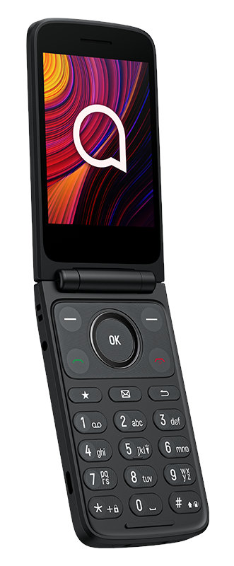 Kobieta tańczy. Na ścianie neonowe serce, a pokój ma kolorowe światła.