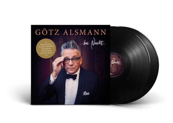 Albumcover mit Götz Alsmann, der seine Brille hält, und zwei schwarzen Schallplatten.
