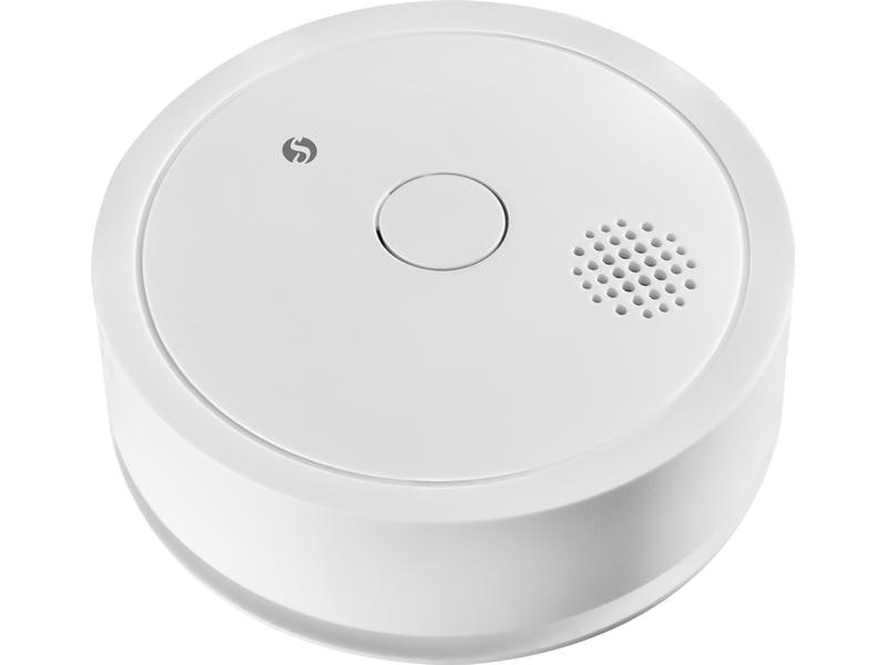 Rilevatore di fumo bianco rotondo con pulsante centrale e fori per altoparlante su sfondo bianco.