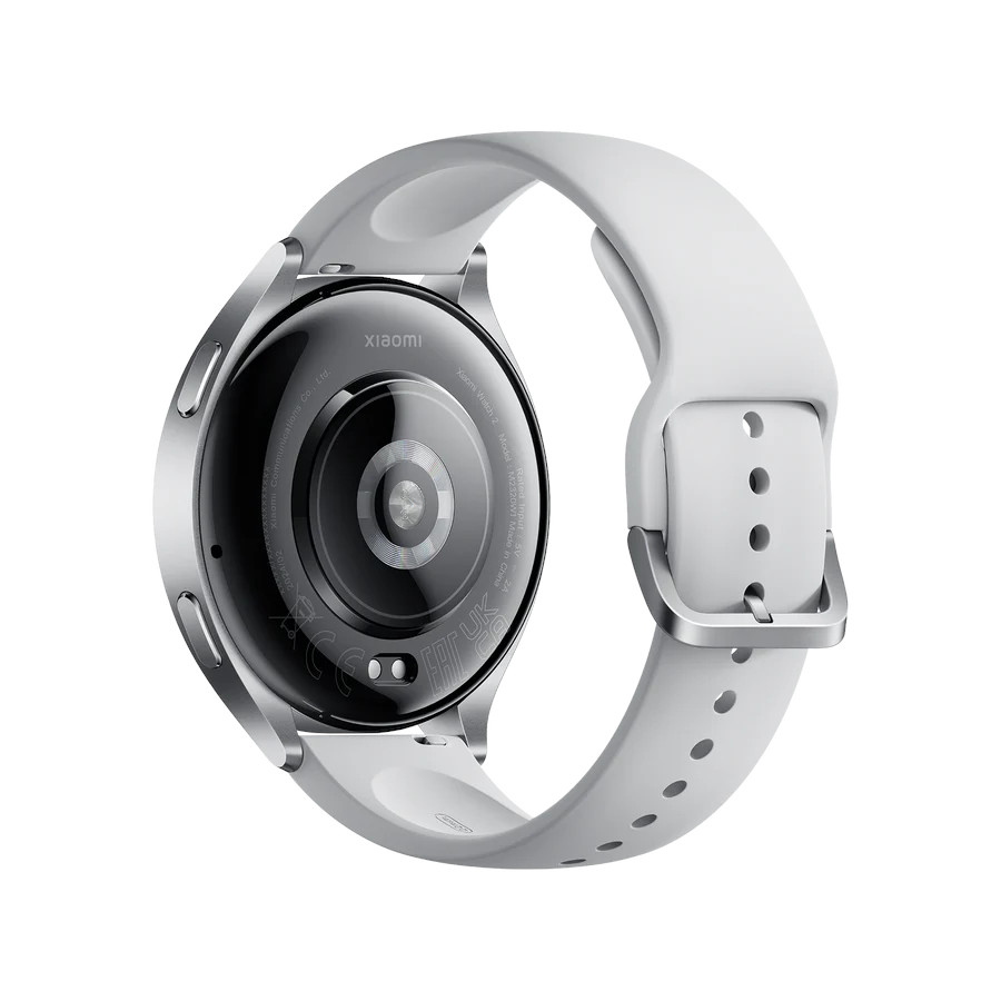 Tył białego smartwatcha z białym paskiem i srebrną kopertą.