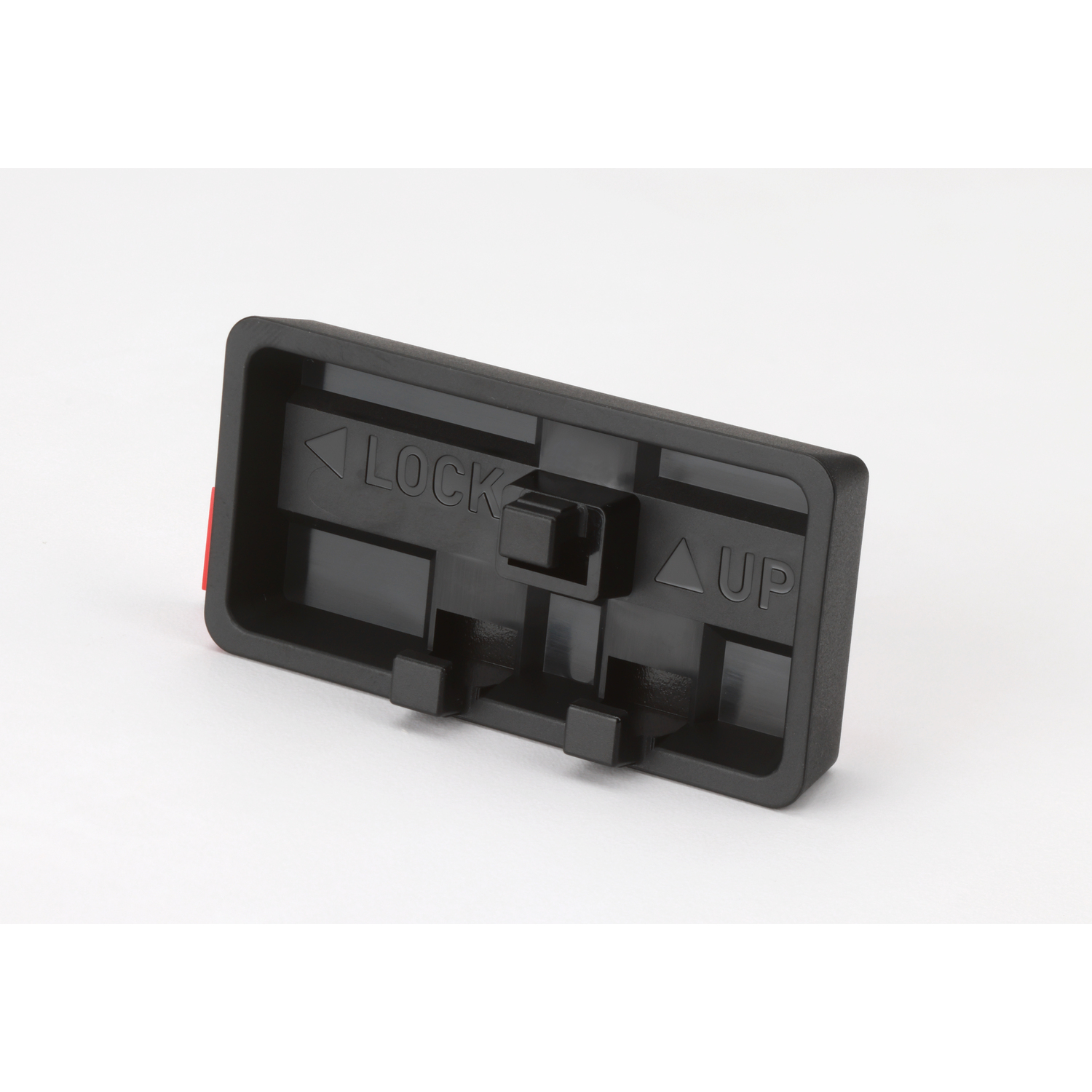 Black plastic piece with arrows and text 'LOCK' and 'UP' on a white background.