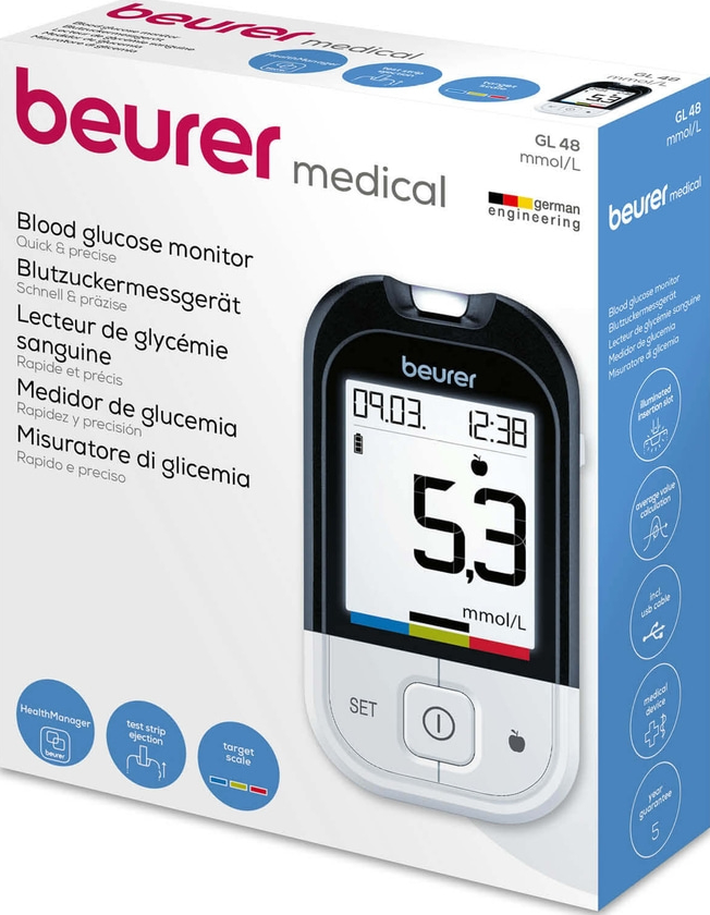 Schachtel mit Beurer Blutzuckermessgerät. Das Messgerät zeigt 5,3 mmol/L an. Text in mehreren Sprachen ist sichtbar.
