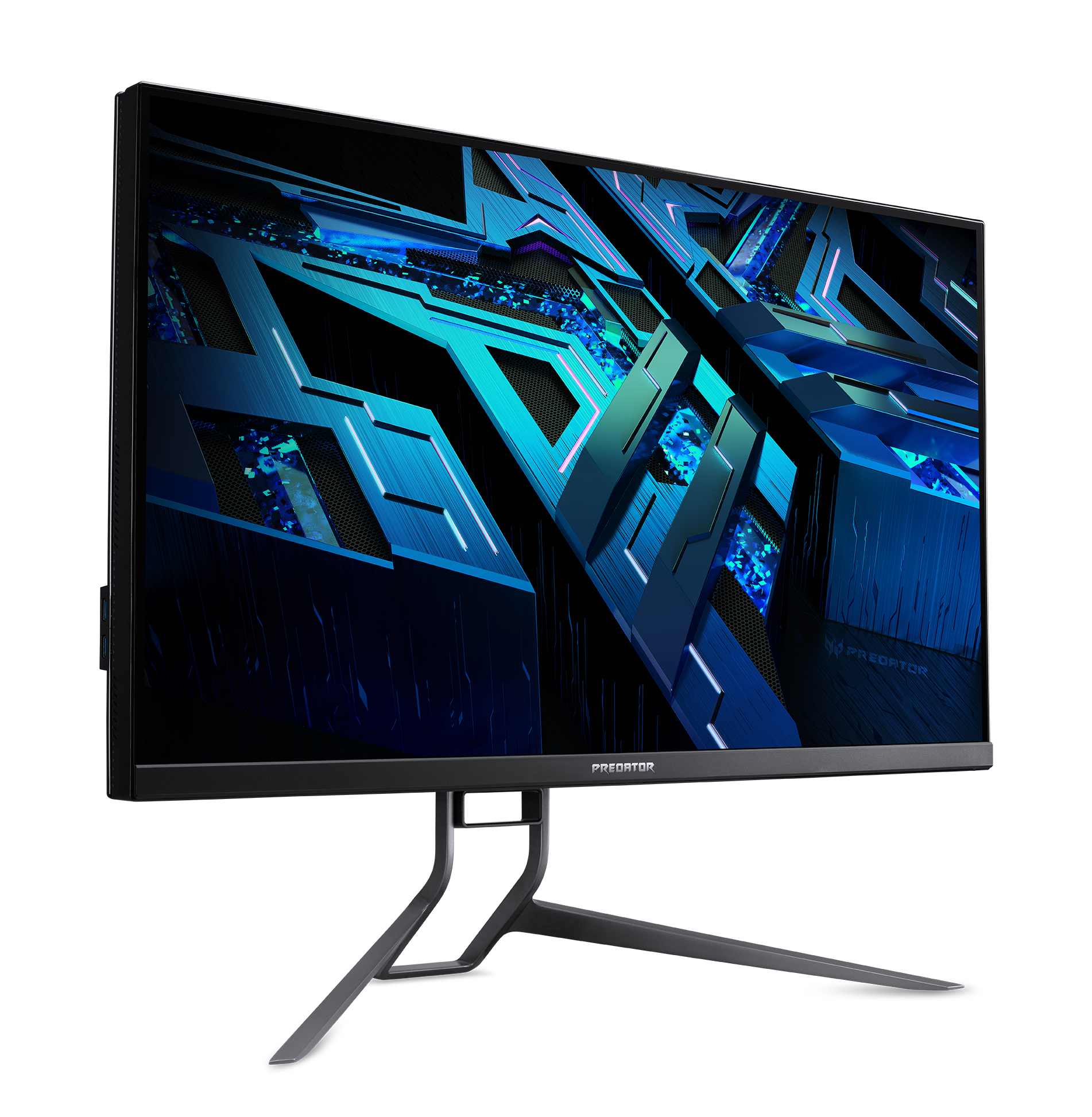 Monitor de juegos negro con un diseño geométrico azul y negro en la pantalla.