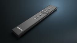 Mando a distancia Siemens negro con botones sobre superficie oscura.
