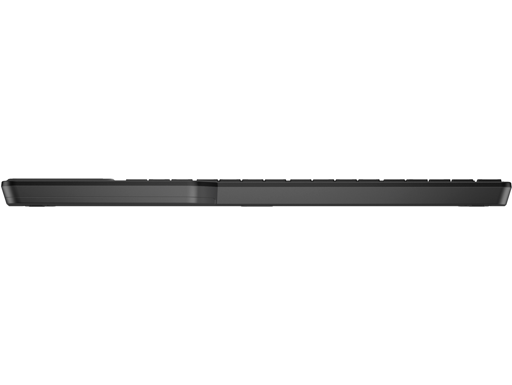 Una vista superior de un teclado negro sobre un fondo negro, simple y elegante.