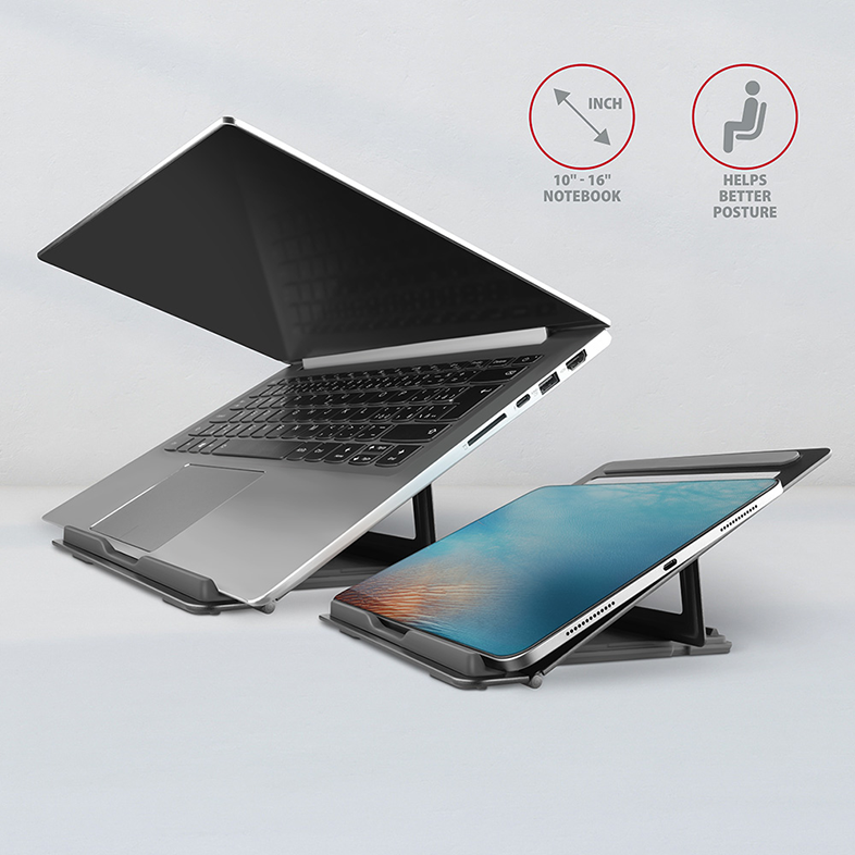 Egy laptop és egy tablet állványokon. A laptop nyitva van. A szöveg tartást jelez.