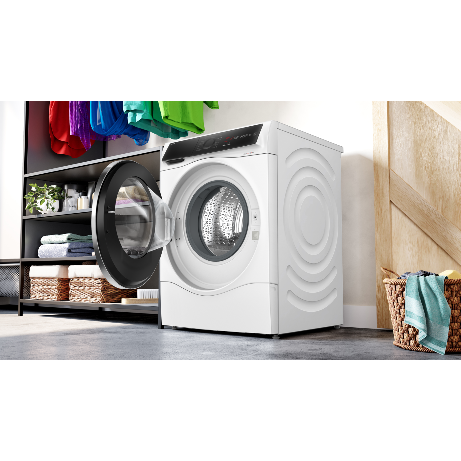 White washing machine with open door.  Black interior.  Laundry room setting.  Clothes on the shelf.