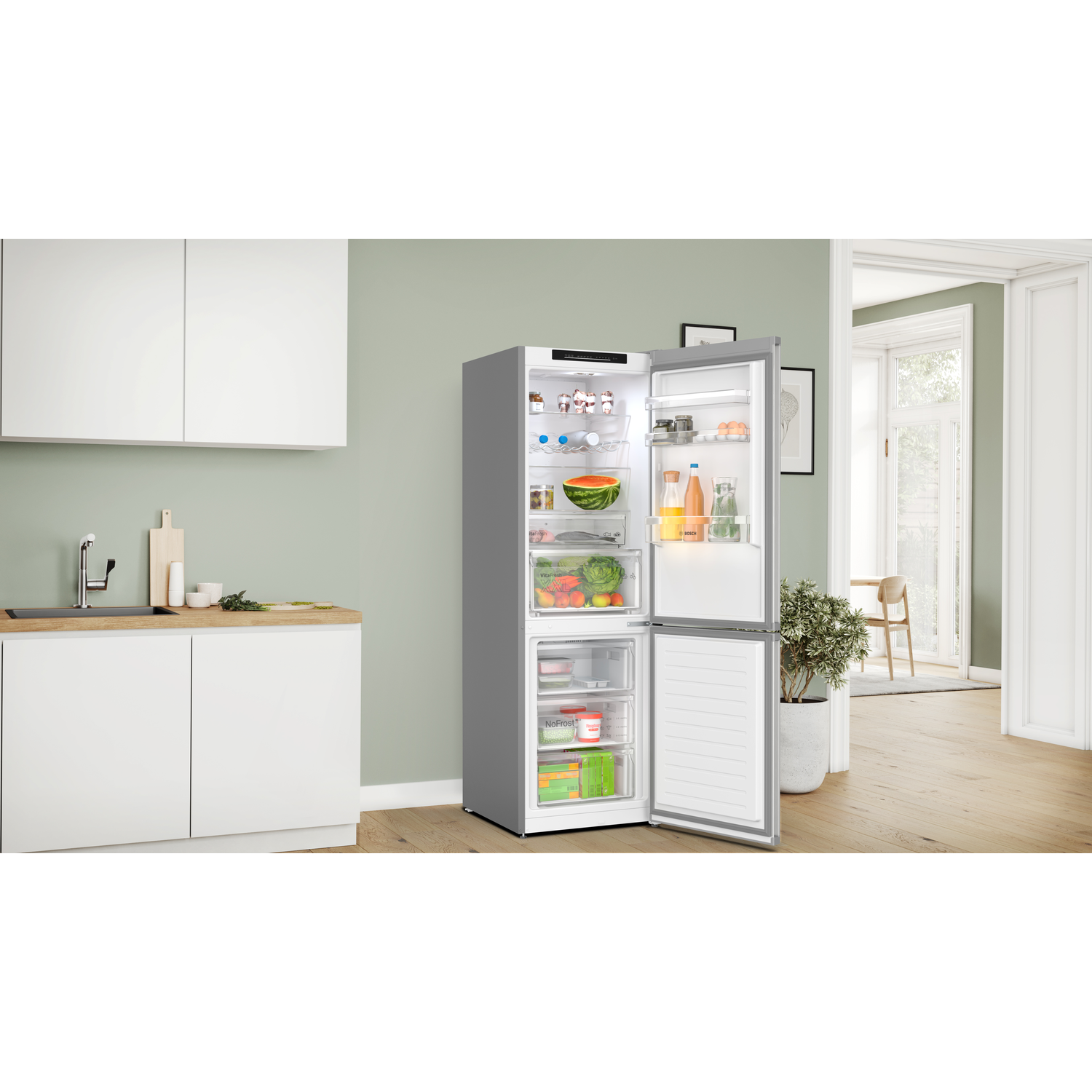 Refrigerator with opened door, showing items inside, with a kitchen scene background.
