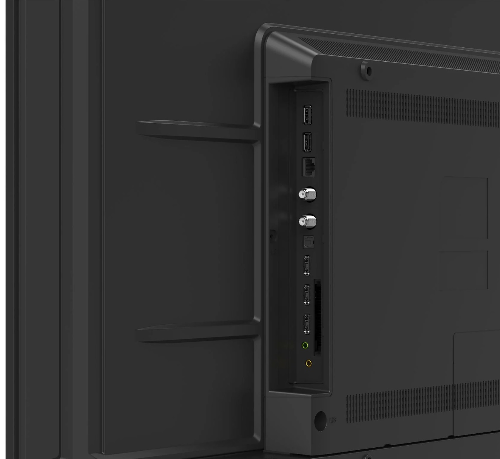 Tył czarnego telewizora. Widoczne porty i złącza. Różne wejścia. Czarne tło.