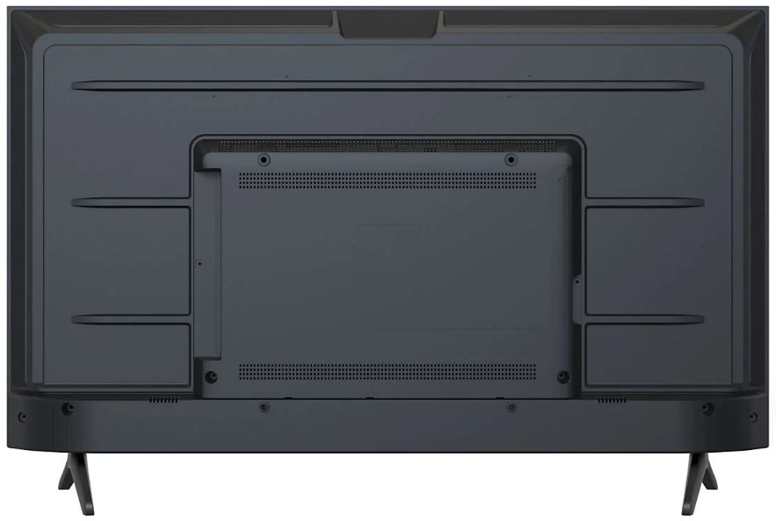 Tył czarnego telewizora z widocznymi portami i otworami wentylacyjnymi.