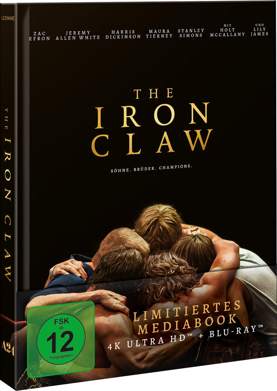 Filmcover: Vier Männer umarmen sich, Titel 'The Iron Claw', Schauspielernamen. Blu-ray-Label links.