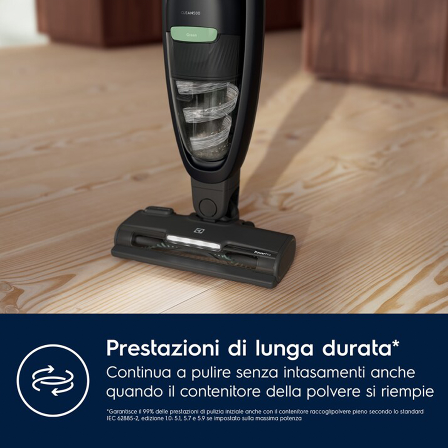 Testa di aspirapolvere nera su pavimento in legno, con testo.