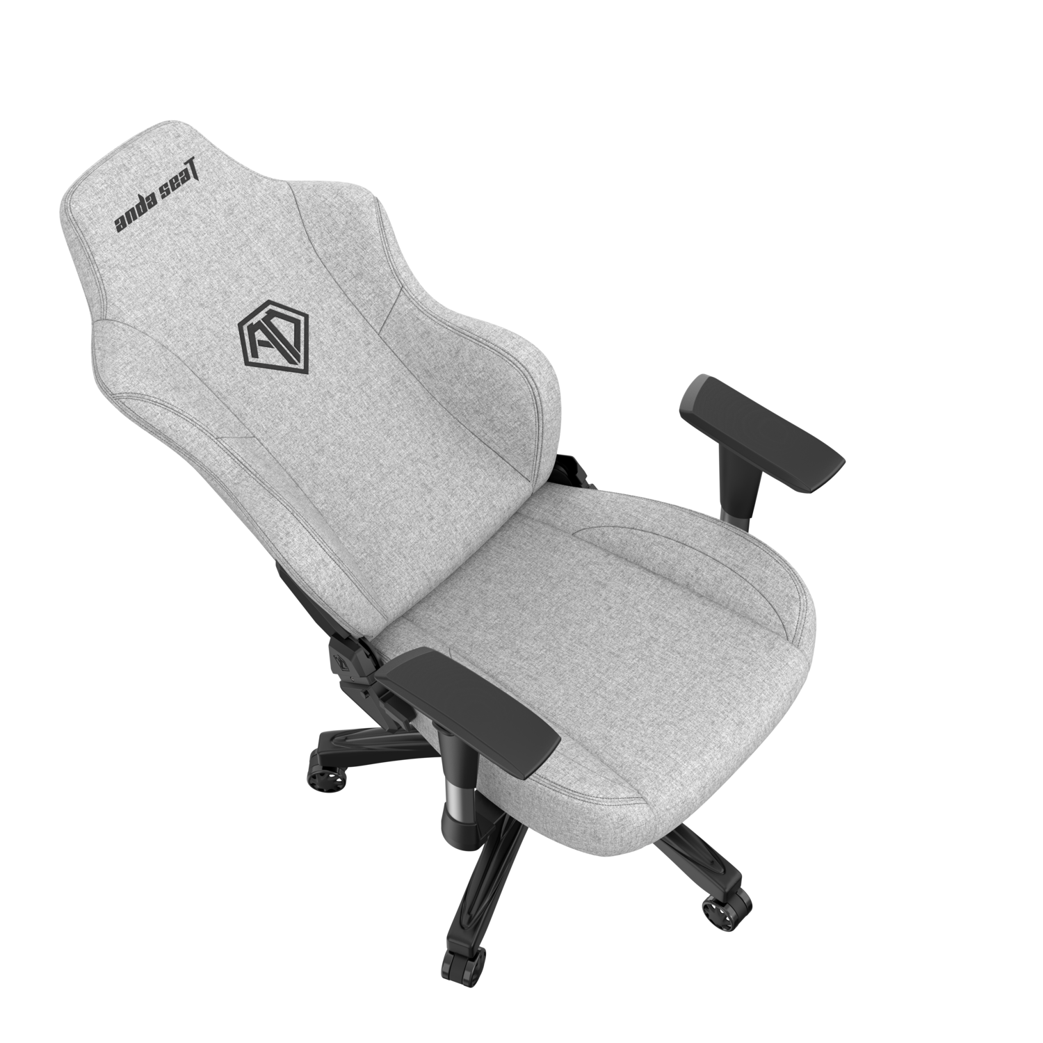 A light gray gaming chair with black armrests and a black base is shown.