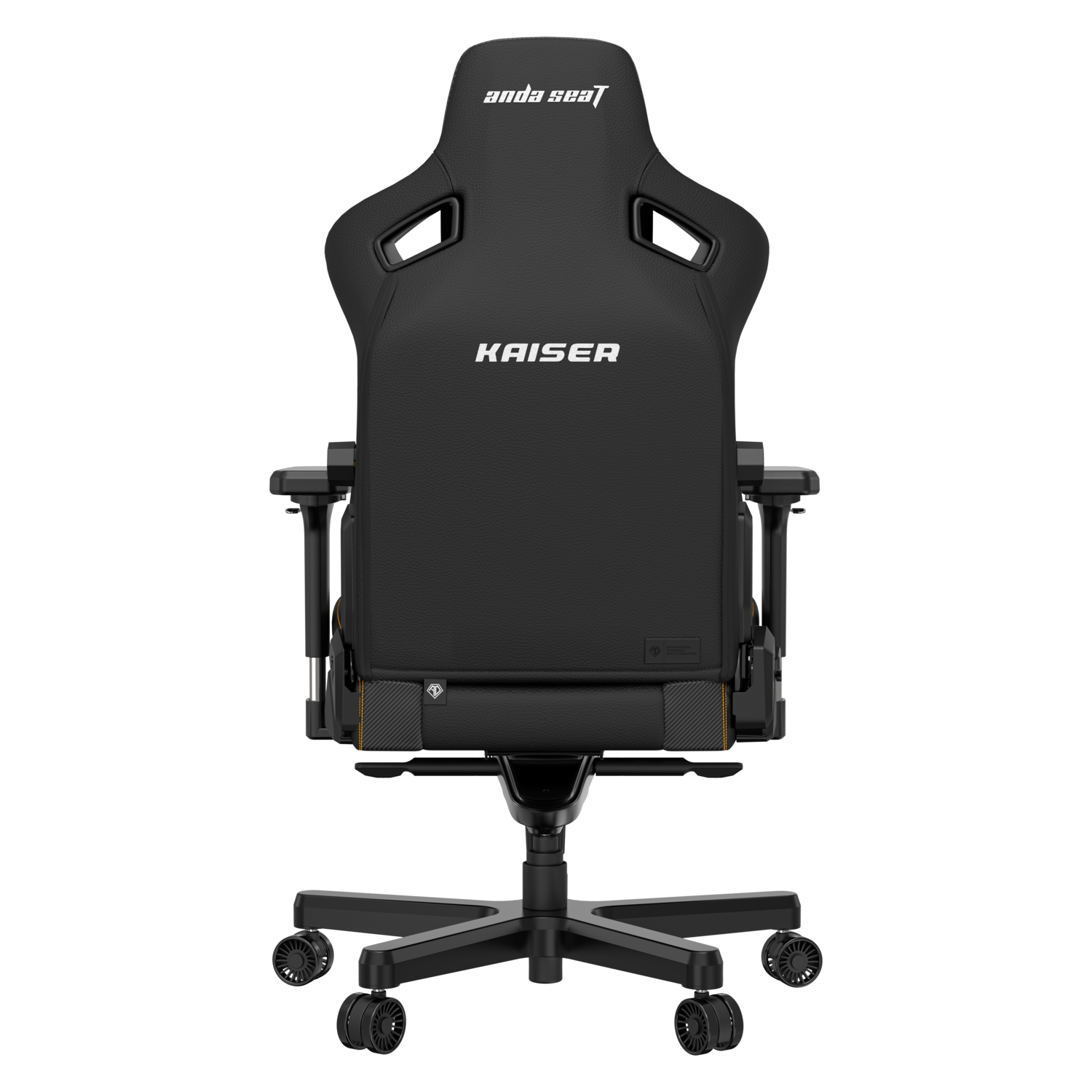 Black gaming chair, back view. The chair has a headrest with 'Anda Seat' and 'Kaiser' on the backrest.