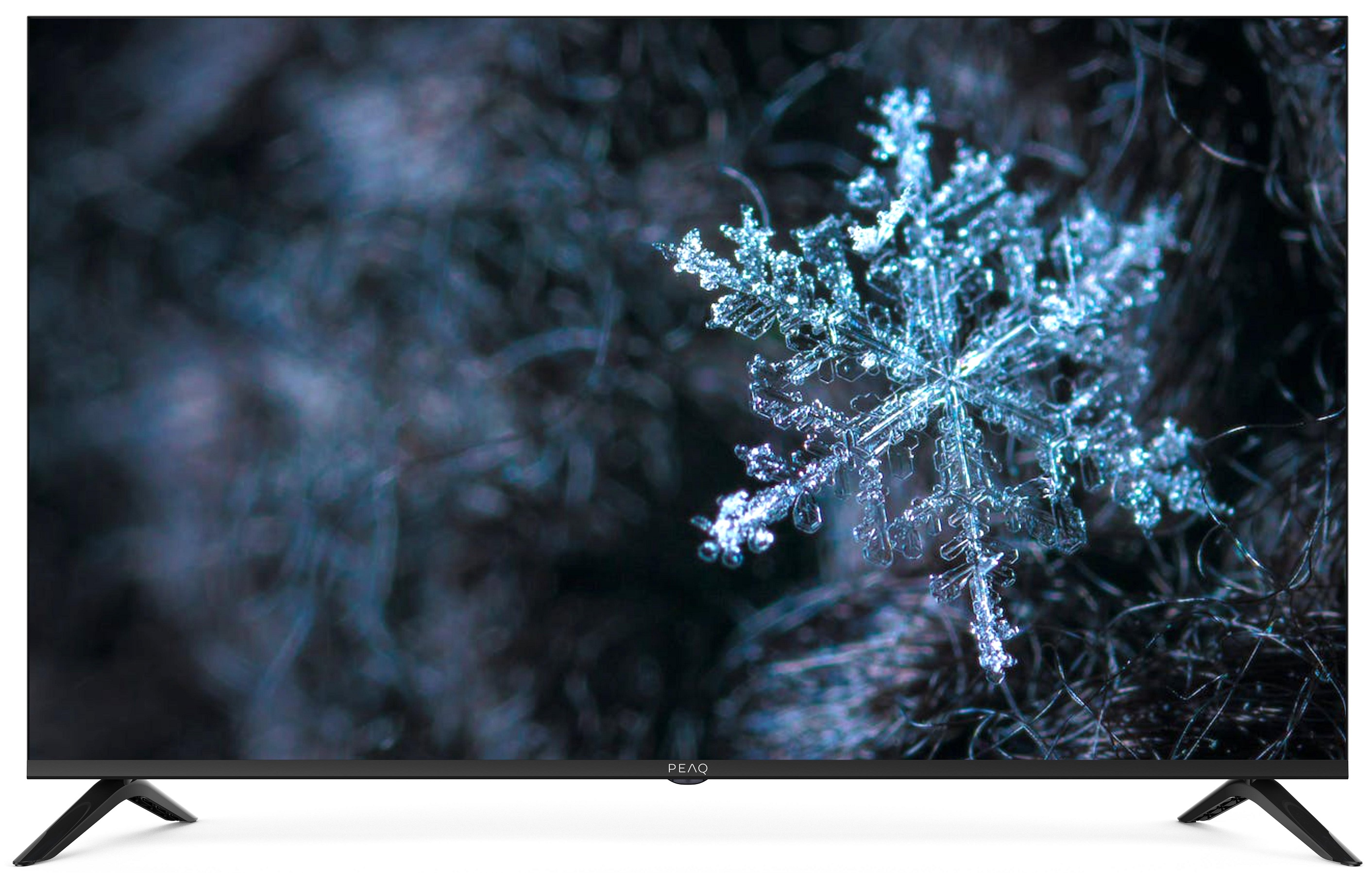Płatek śniegu na ekranie TV, ciemne tło. Płaski ekran, ciemna ramka, logo PEAQ.