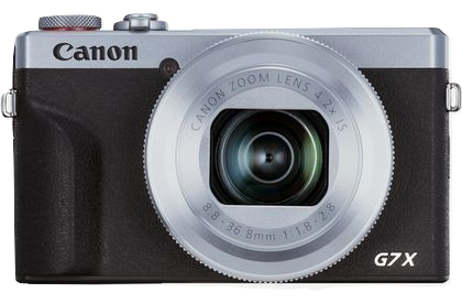 Canon G7X Kamera, silber und schwarz, mit Zoomobjektiv. Schwarzer Hintergrund.