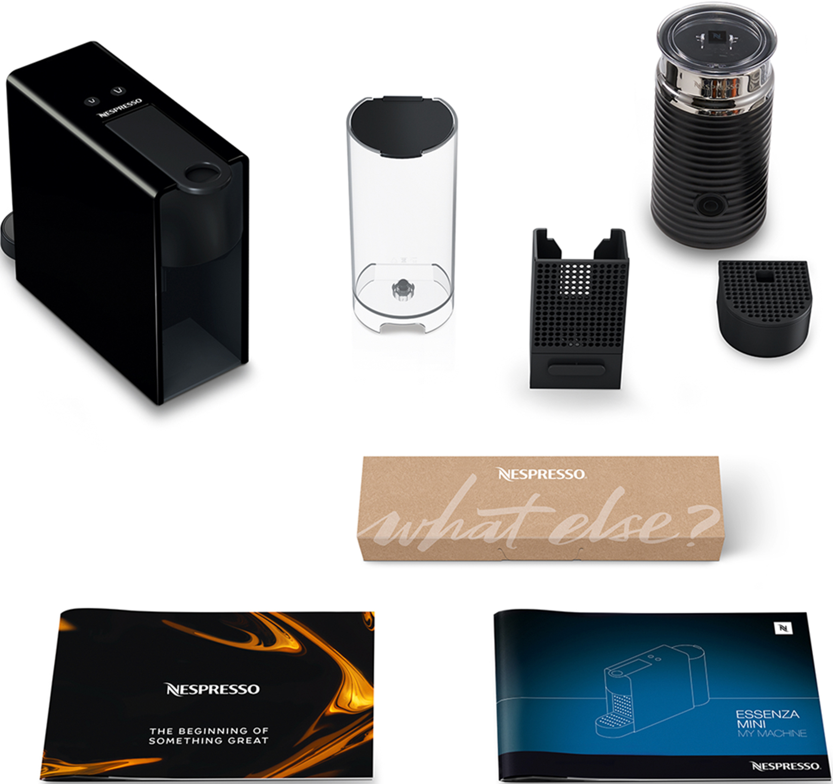 Eine schwarze Nespresso-Maschine und Zubehör, mit einer Box mit der Aufschrift "what else?".