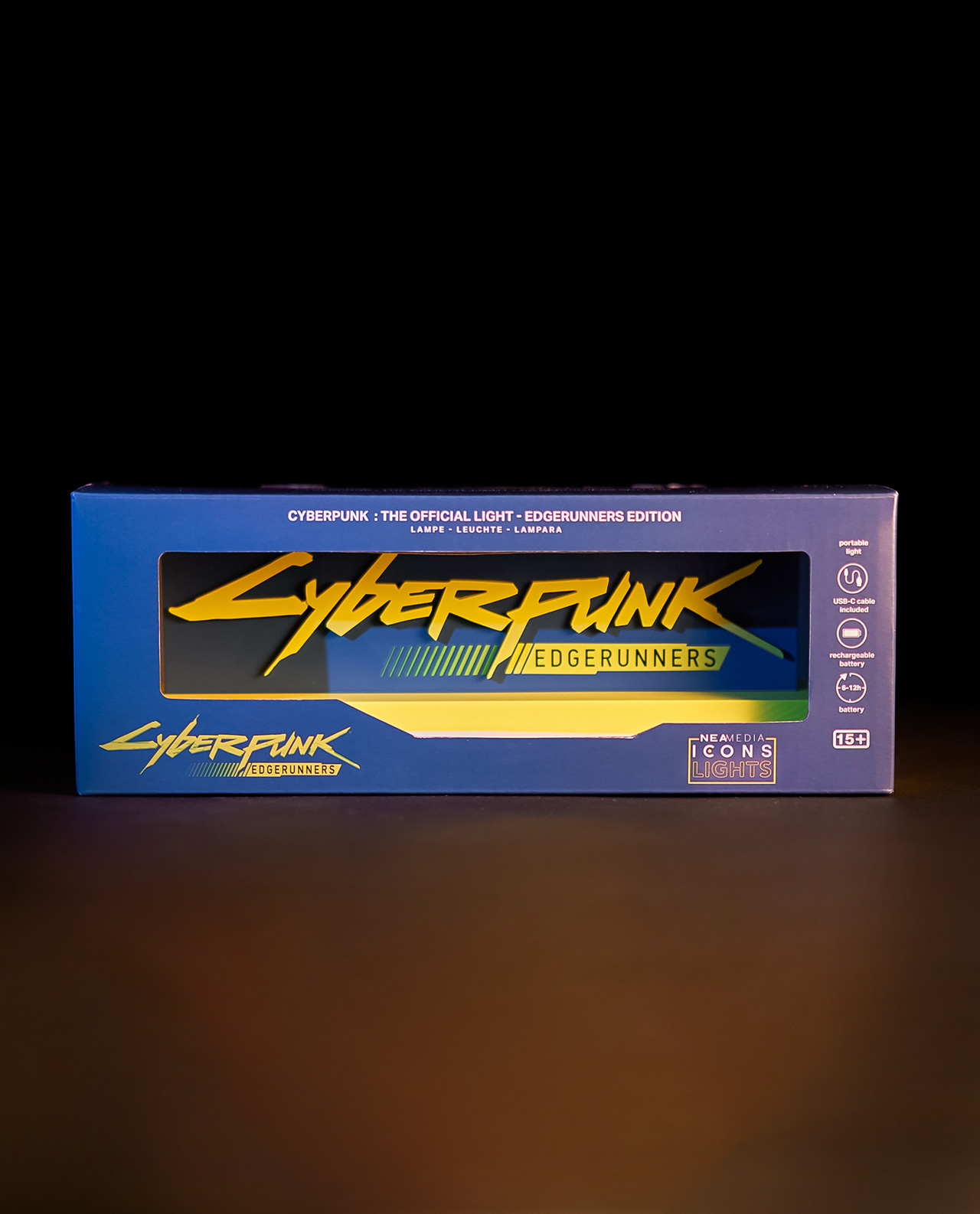 Box mit Cyberpunk-Logo in Gelb und dem Text "EDGERUNNERS". Schwarzer Hintergrund.