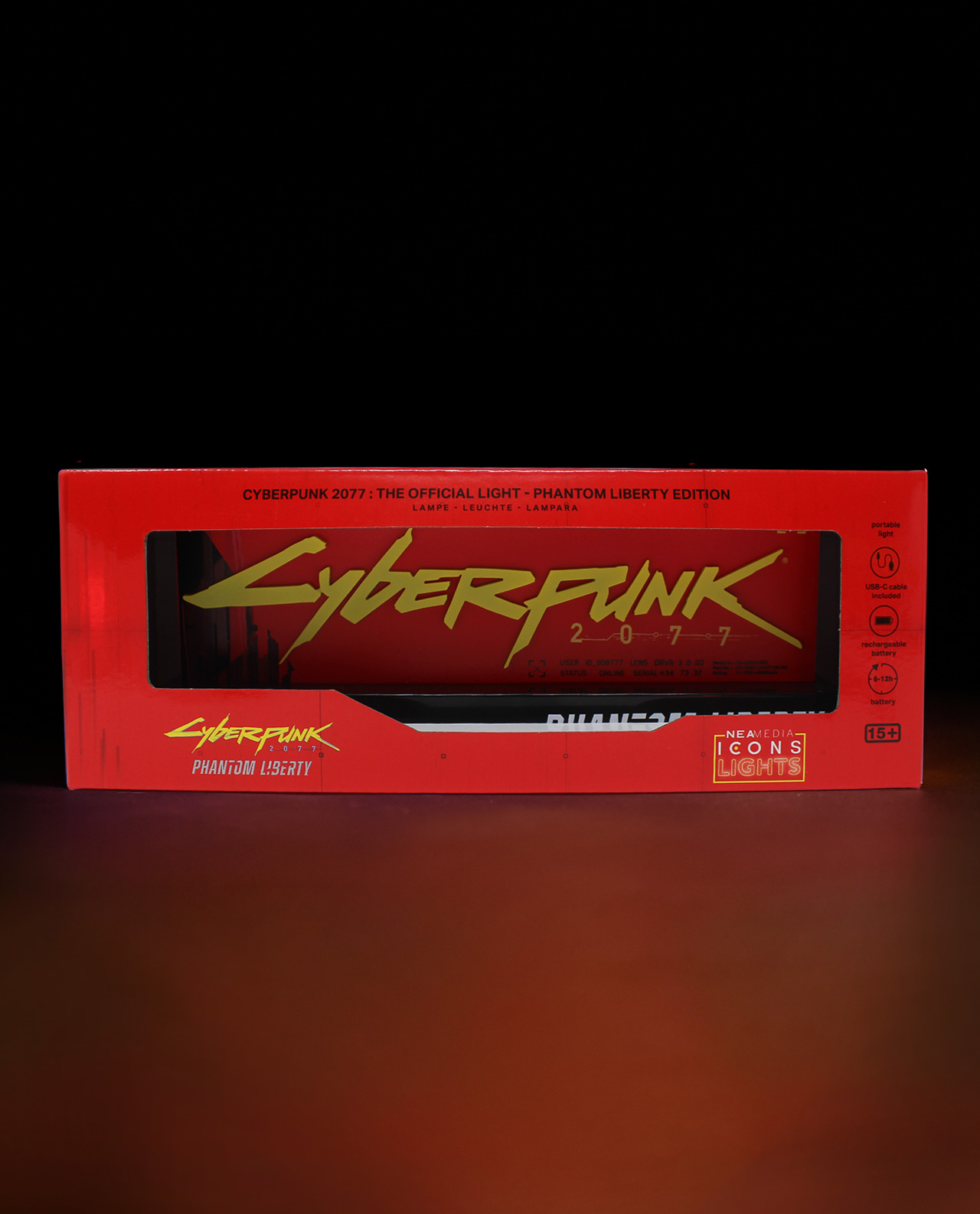 Cyberpunk 2077-Box mit Neonlichtern, rot und gelb. Text: Cyberpunk 2077.