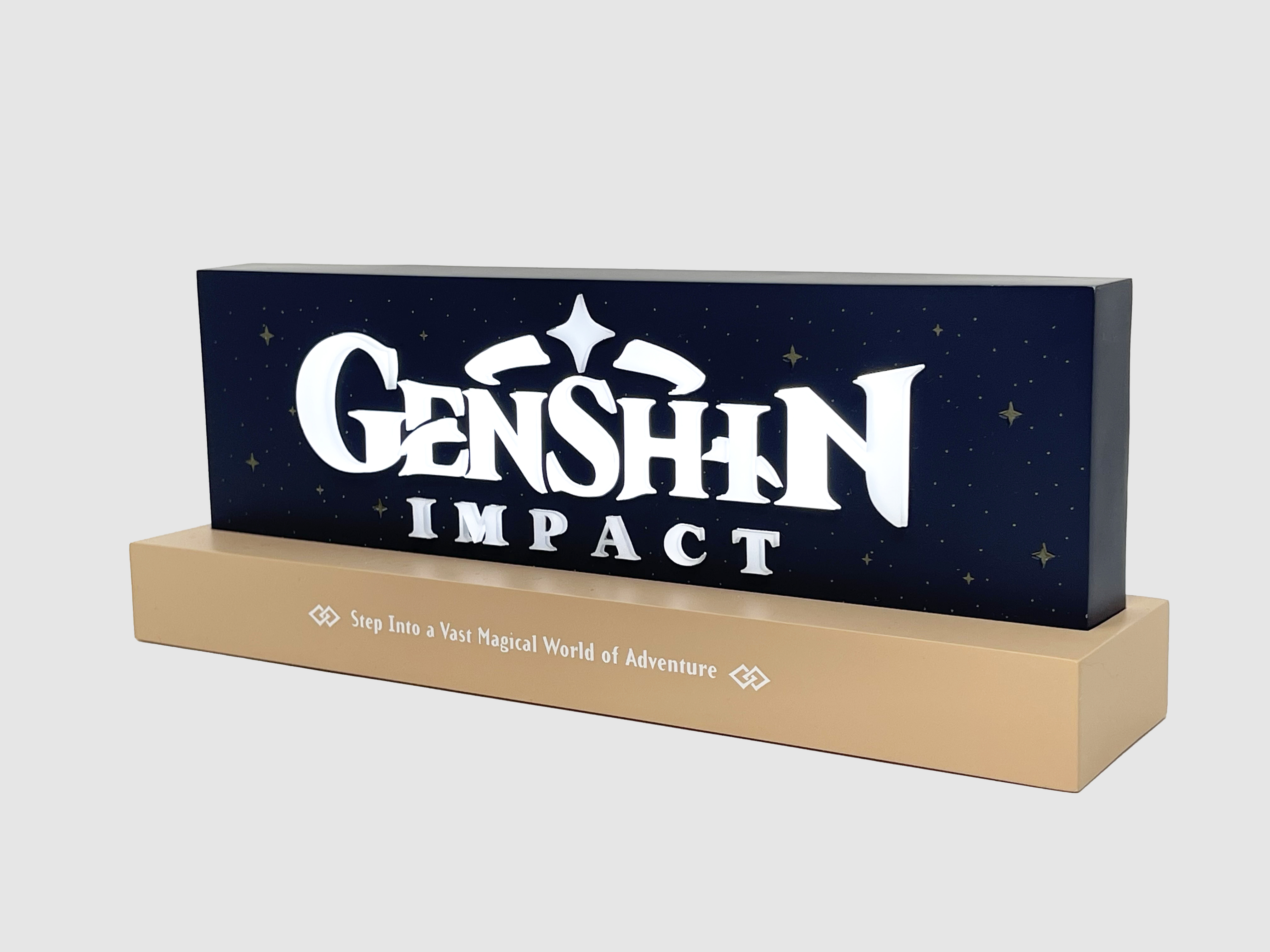 Ein beleuchtetes Schild für 'Genshin Impact' mit dunkelblauem Hintergrund und goldener Basis.