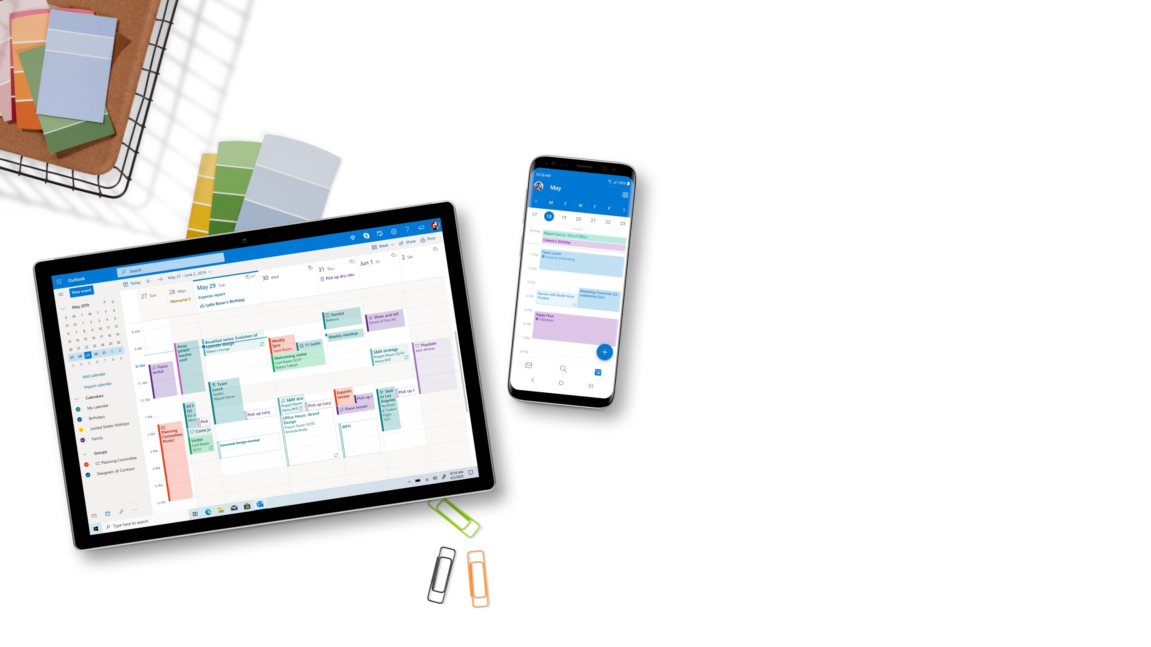 Tablet en telefoon met agenda-apps.