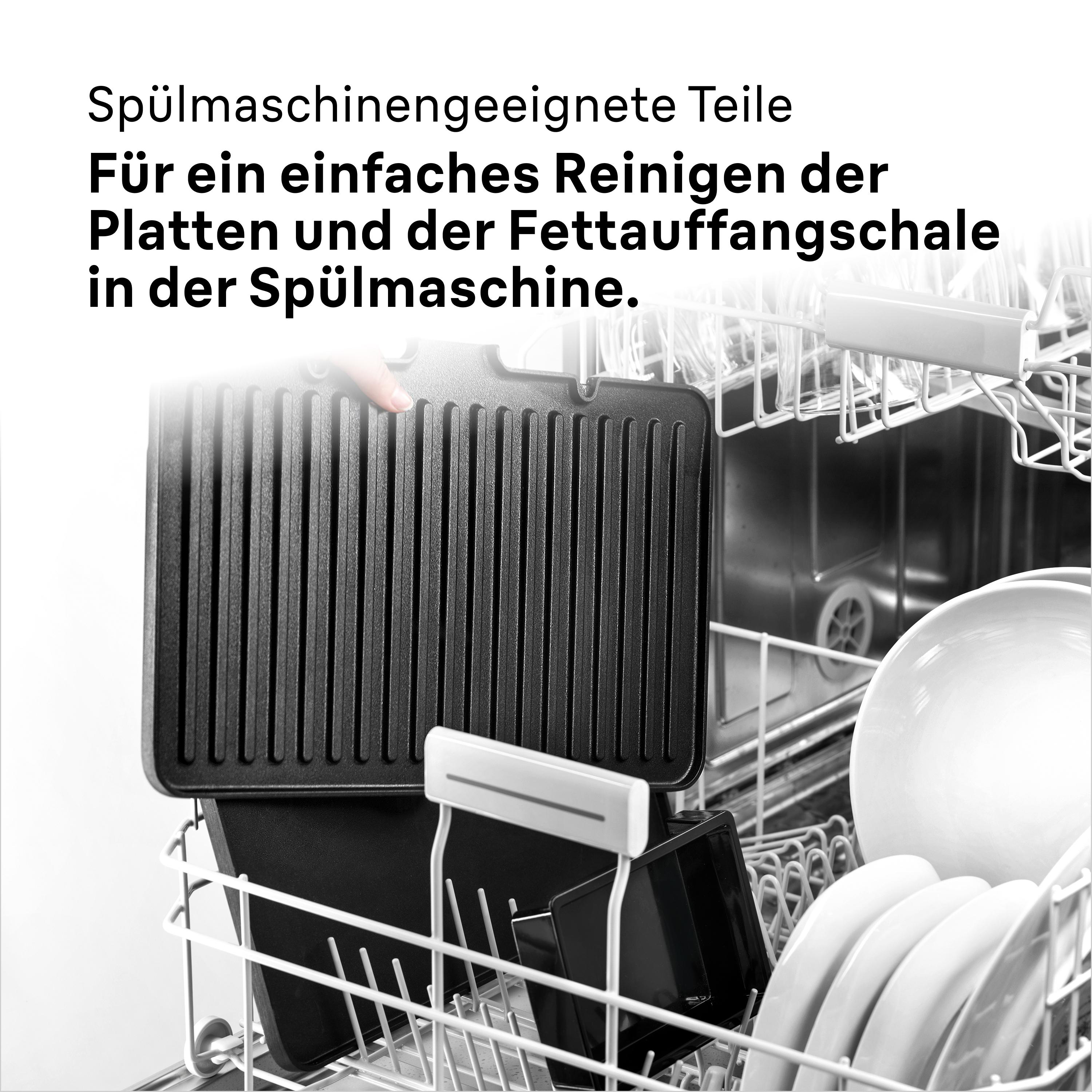 Eine schwarze Grillpfanne und andere Gegenstände in einer Spülmaschine.