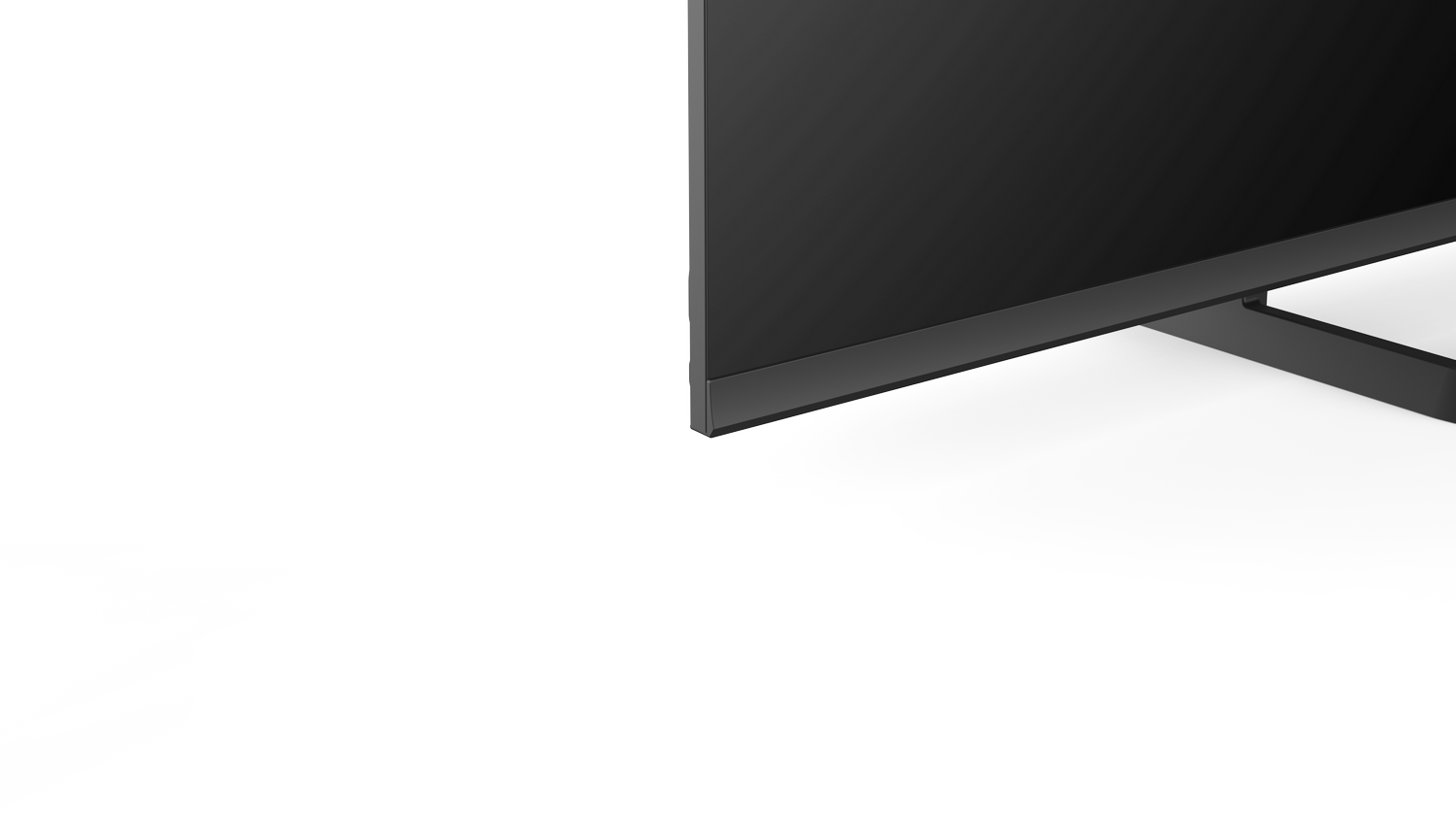 Primer plano de la esquina inferior derecha de una pantalla de TV negra.
