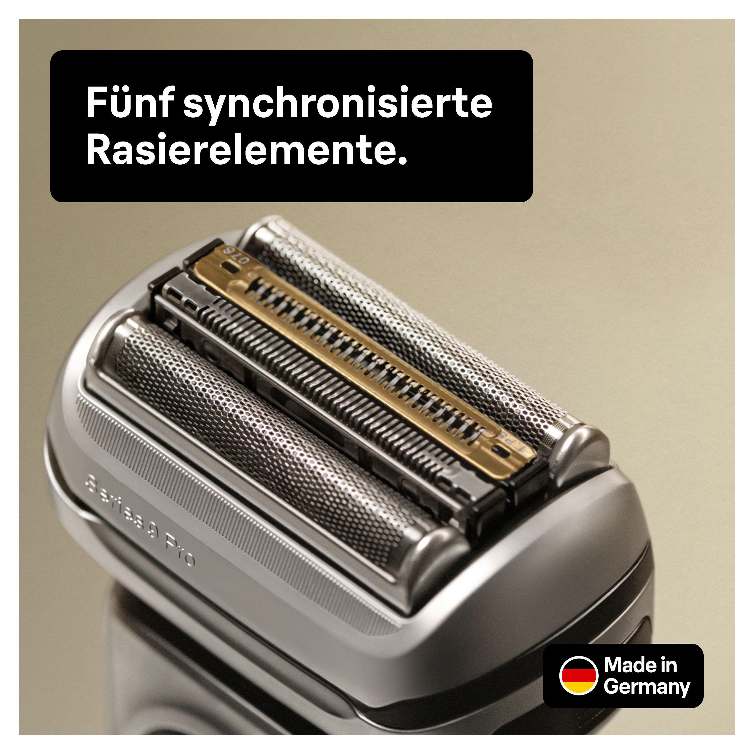 Nahaufnahme eines silber-schwarzen Rasiererkopfes mit fünf synchronisierten Elementen.