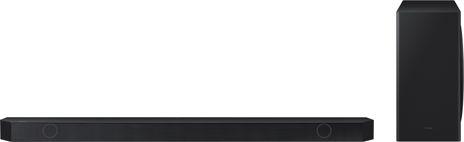 Egy fekete soundbar fekete mélynyomóval, fekete háttér előtt, házimozihoz.