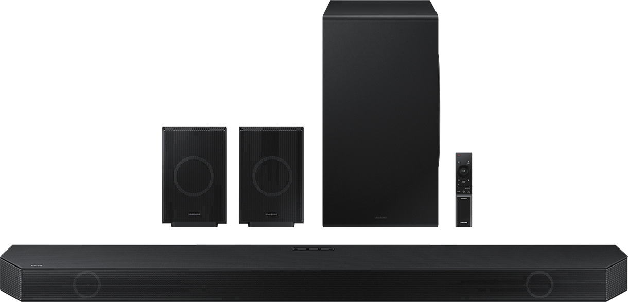 Schwarzes Soundsystem-Setup. Soundbar, Subwoofer und zwei Satellitenlautsprecher.