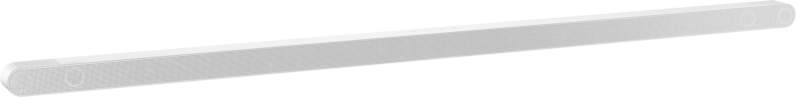 Fehér soundbar, megnyúlt forma, apró lyukak, fekete háttér.