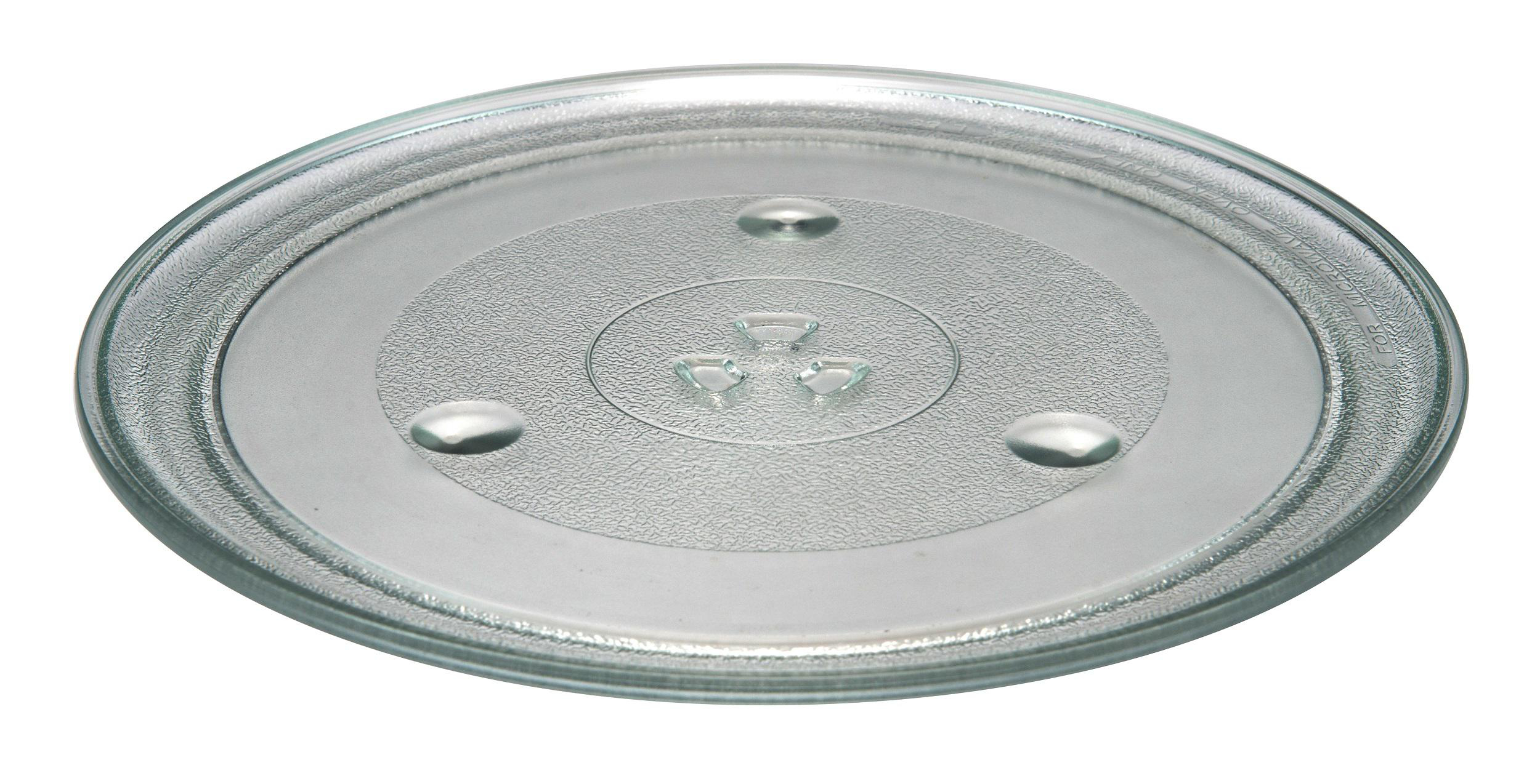 Eine klare, runde Glas-Mikrowellenplatte mit drei kleinen kreisförmigen Füßen und strukturiertem Zentrum.