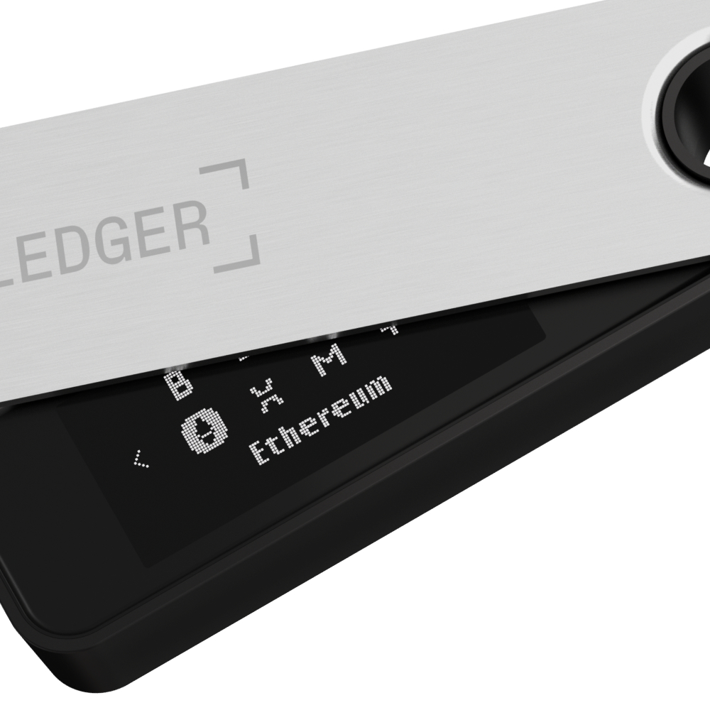 Ledger Hardware-Wallet, schwarz und silber, mit Textanzeige.