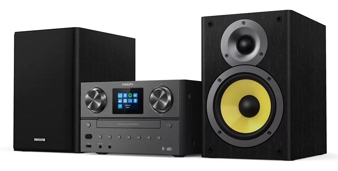 Czarny system audio z głośnikami. Mała jednostka pośrodku.