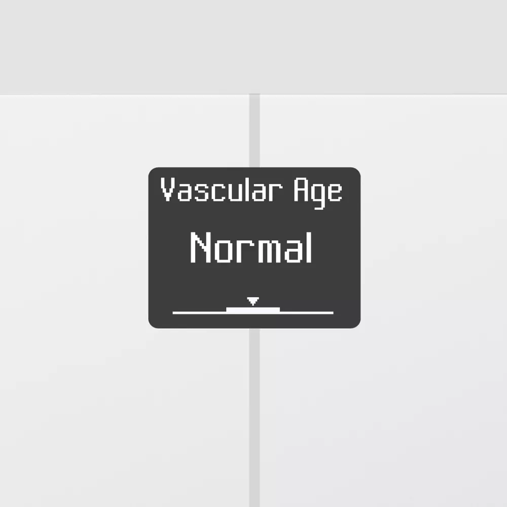 Fekete-fehér képernyő a „Vascular Age Normal” szöveggel és egy csúszkával.