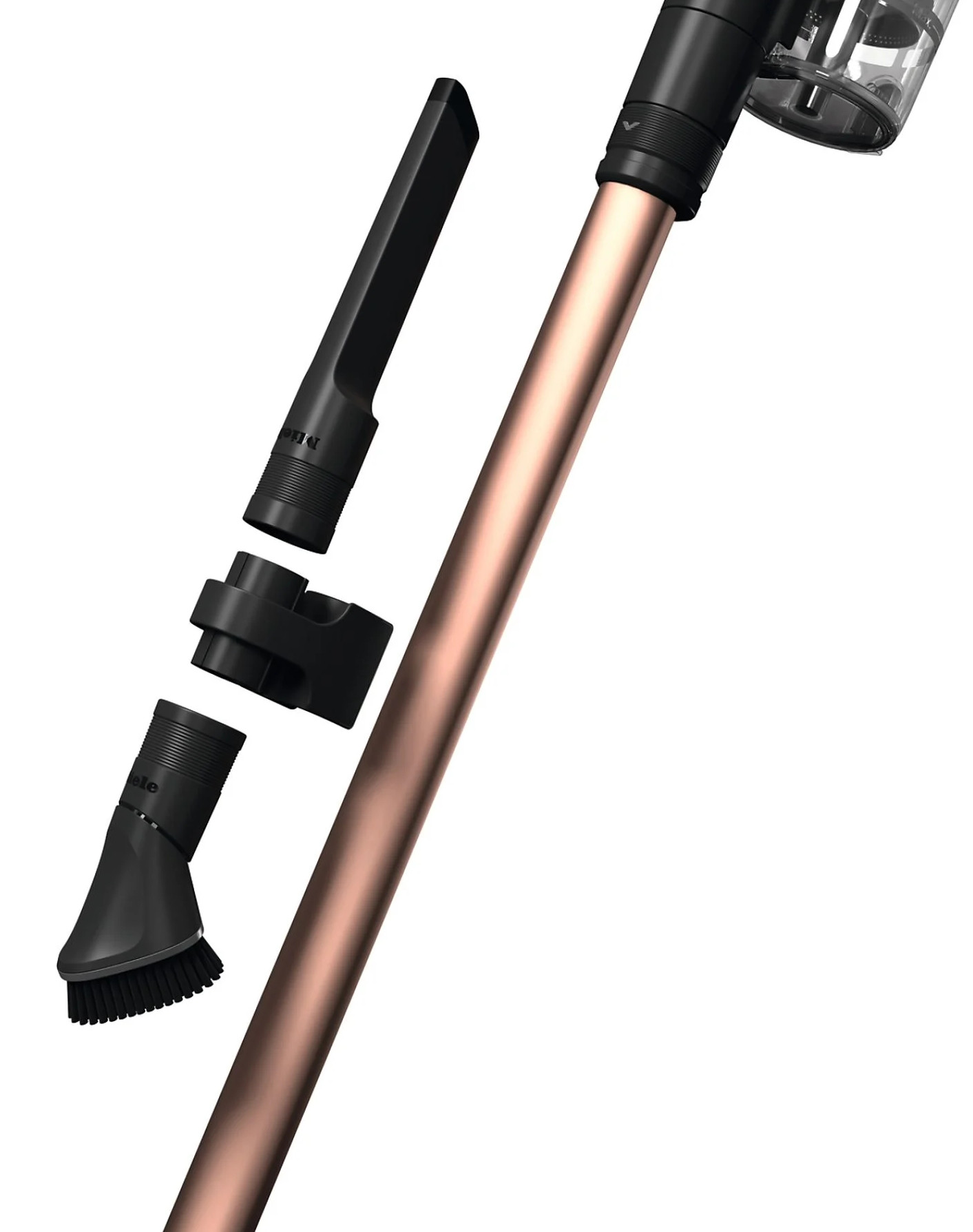 Odkurzacz z nasadkami, z rurą w kolorze różowego złota i czarnymi nasadkami, na białym tle.