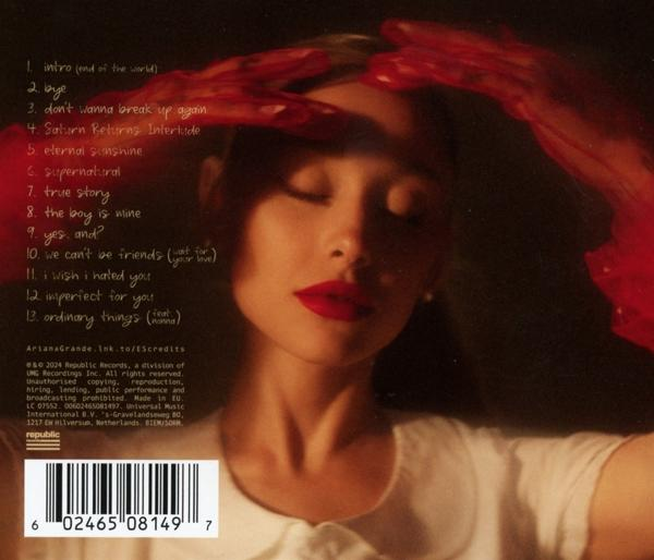 Albumcover mit Frauengesicht und roten Händen. Text und Trackliste sind sichtbar.