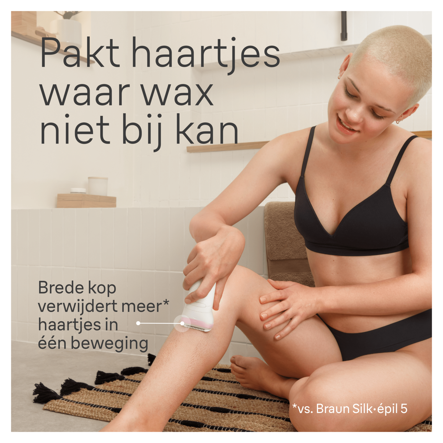 Woman shaving legs with epilator, black lingerie, and a rug.